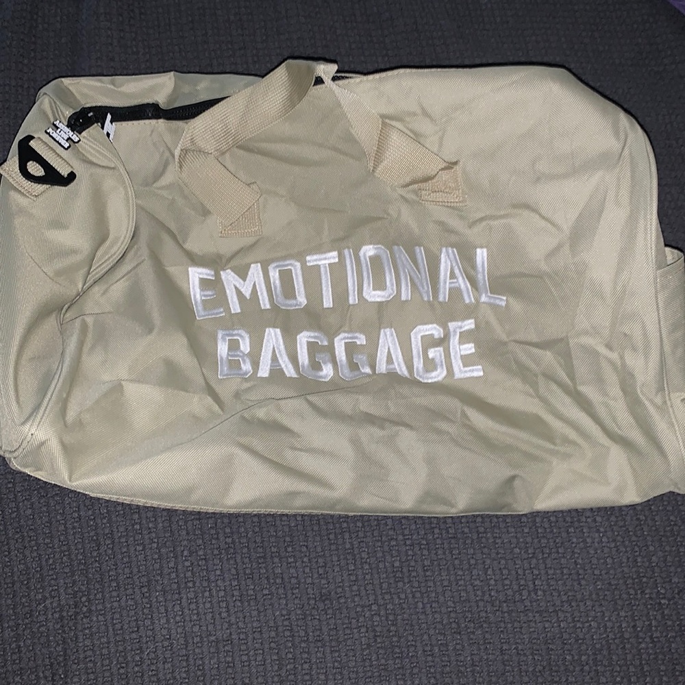 NWOT emotional baggage duffel bag - never been used